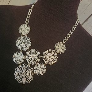 Charming Charlie silvertone filigree circles bib statement necklace
